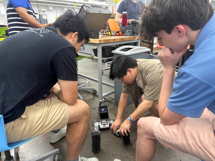The Mini π sub-scale humanoid testbed.